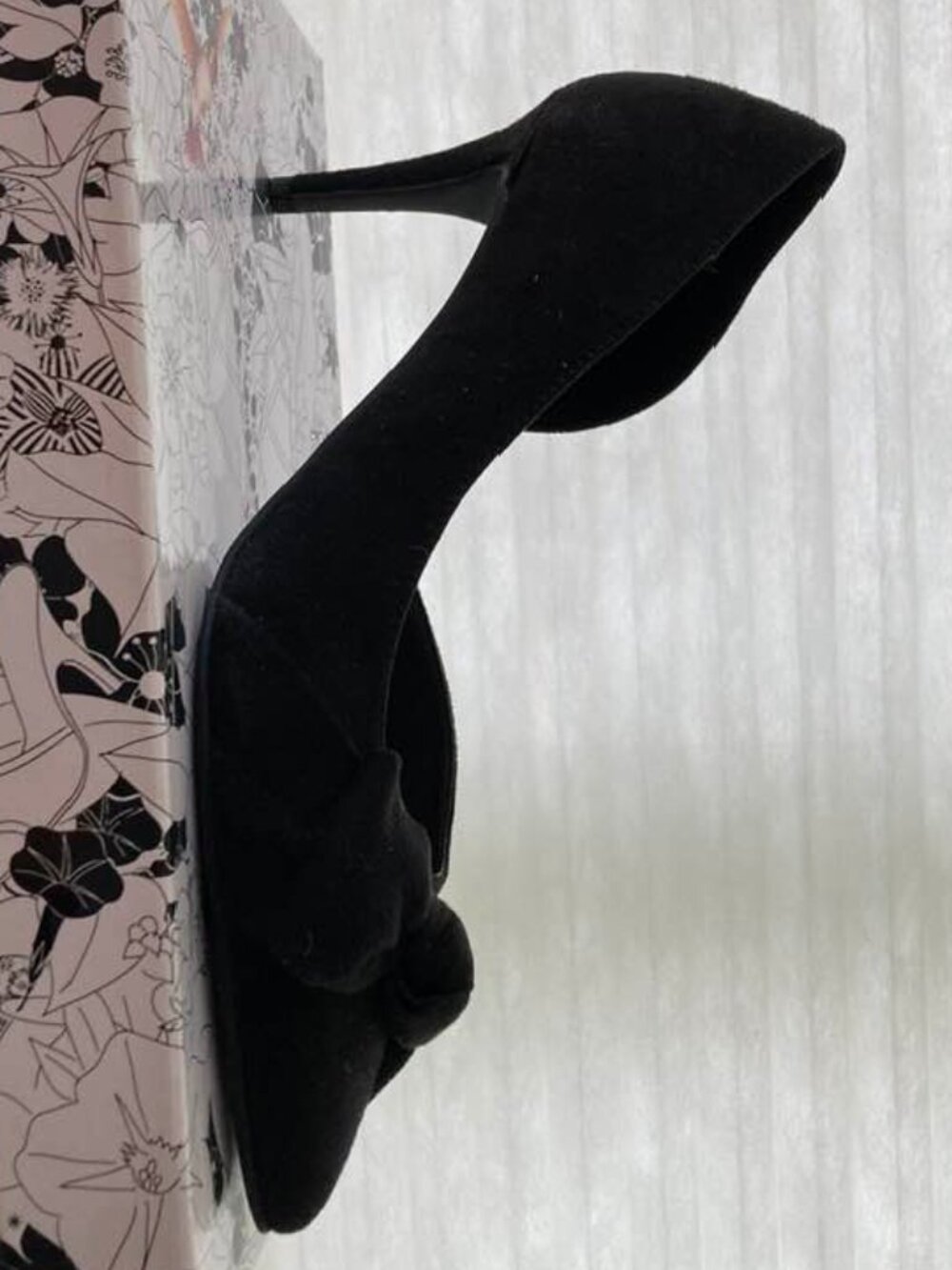 Black suede pumps